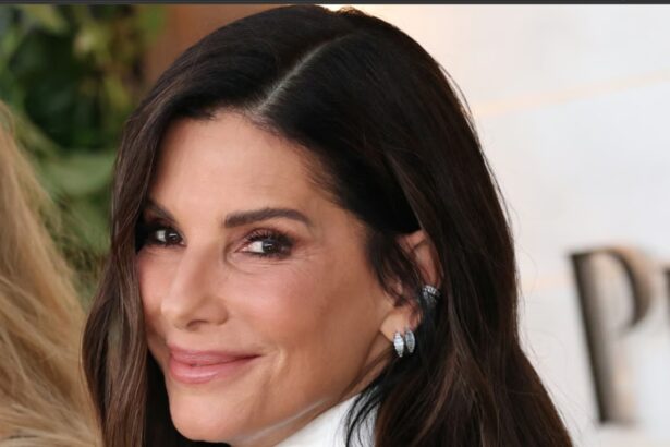 Sandra Bullock with her two adopted children Louis and Laila in a family-themed editorial image