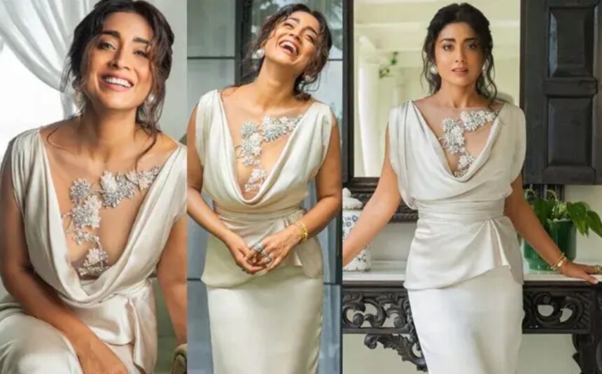 Hunterfly 026 09 11 080630 Shriya Saran poses in an elegant white dress with statement pearl earrings