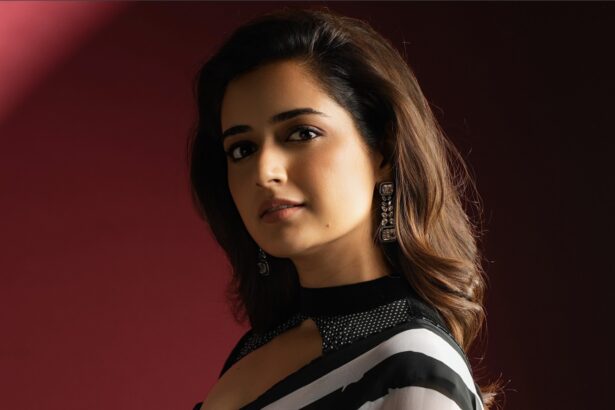 Ashika Ranganath in a black and white striped saree at the Sardar 2 pre-release event