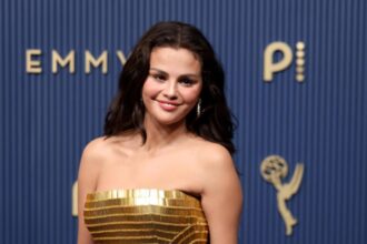 Hunterfly 026 09 15 232643 Selena Gomez wears a gold Louis Vuitton gown at the 2026 Emmy Awards