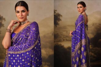 Kriti Sanon wearing a royal blue Bandhani saree with pearl jewellery at Ganesh Chaturthi celebrations
