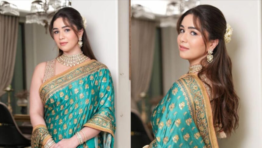 Hunterfly 026 09 17 091811 Sara Tendulkar in a Tiffany blue Ritu Kumar saree for Ganesh Chaturthi