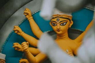 Goddess Durga idol adorned with gold jewellery at Siliguri Durga Puja