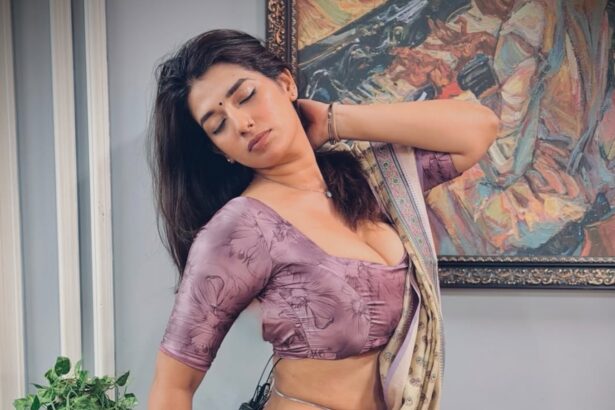 Hunterfly 026 09 19 081029 Rasha Kirmani in a purple floral saree