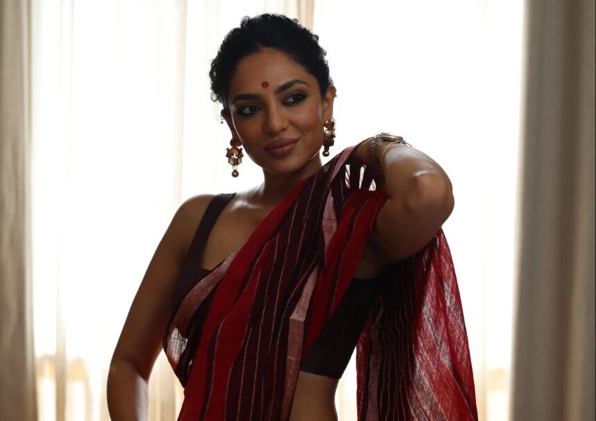 Sobhita Dhulipala wearing a red khadi saree with traditional Tamil-inspired jewellery