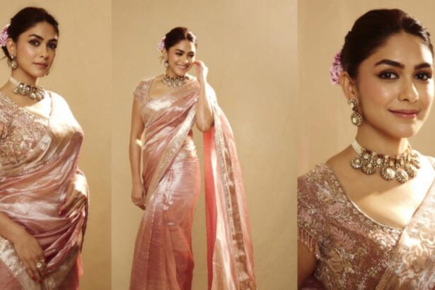 Mrunal Thakur in a mauve pink saree with statement jewellery and floral bun