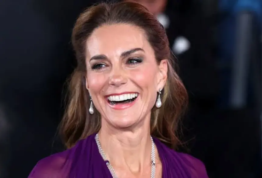 Kate Middleton laughs after her gown is accidentally stepped on at the Digger premiere in London