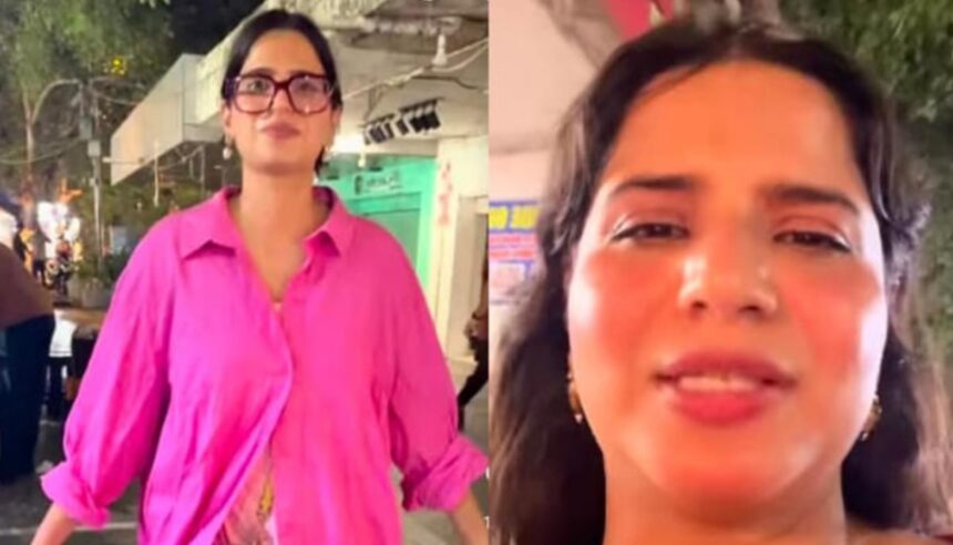 Hunterfly 2026 09 17 113412 Woman puts on a pink shirt after feeling uncomfortable in Connaught Place