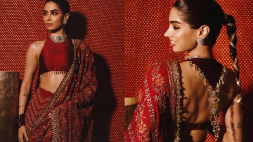 Khushi Kapoor in a red Manish Malhotra saree with a 25-carat emerald choker