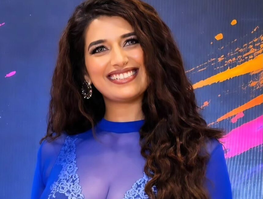 Rasha Kirmani in a sheer royal blue gown at Rocket Reels anniversary celebration