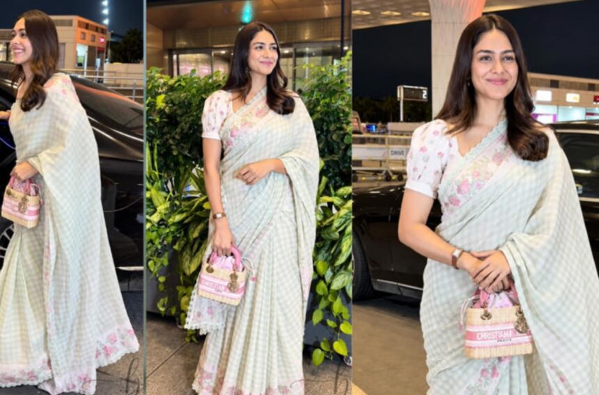 Hunterfly 2026 09 21 182107 Mrunal Thakur in a pastel saree with a Dior Lady Dior bag at the airport