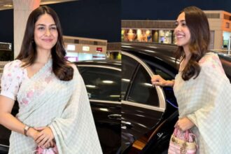 Hunterfly 2026 09 22 160011 Mrunal Thakur in a pastel saree with a Lady Dior bag at the airport