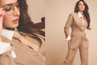 Kiara Advani wearing a beige power suit with aviator sunglasses