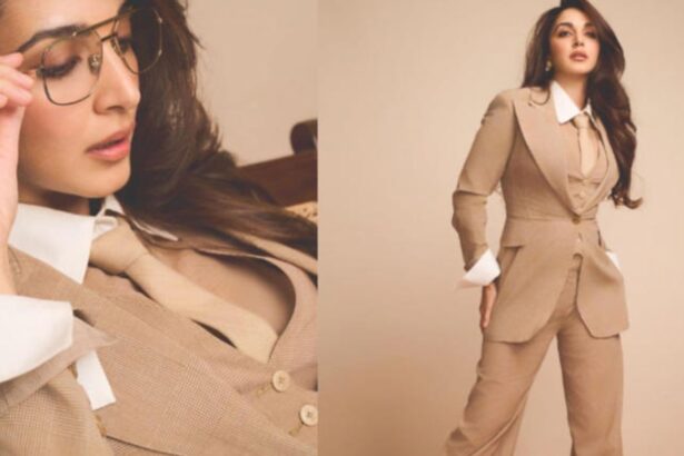 Kiara Advani wearing a beige power suit with aviator sunglasses