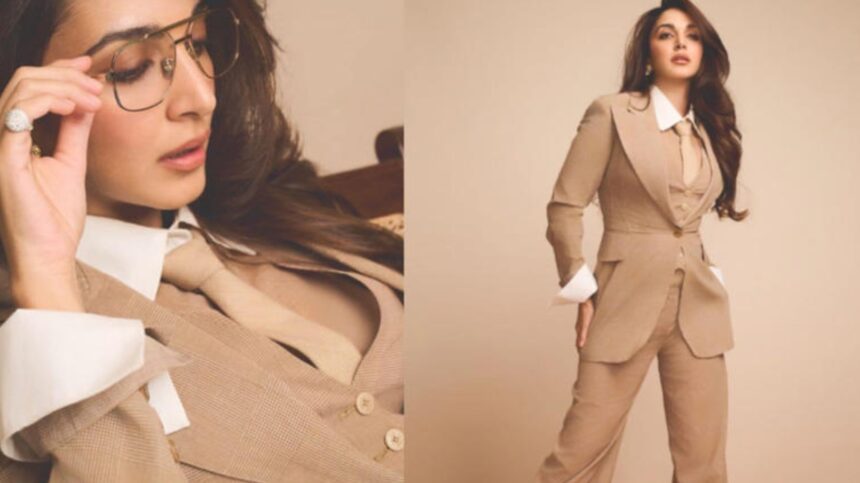 Kiara Advani wearing a beige power suit with aviator sunglasses