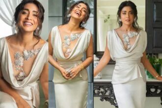 Shriya Saran poses in a striking white dress with statement pearl earrings