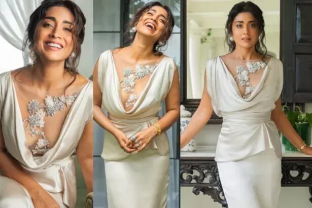 Shriya Saran poses in a striking white dress with statement pearl earrings
