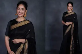 Yami Gautam wearing a black Maheshwari saree at the National Film Awards