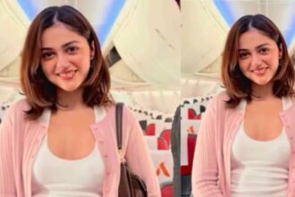 Hunterfly 6 09 02 154447 Aneet Padda-inspired off-duty outfit with a pink cardigan, white top, relaxed trousers and brown sling bag