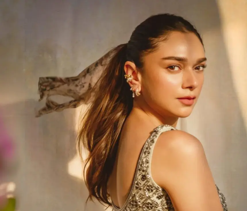 Aditi Rao Hydari wearing a sparkly Anushka Khanna sharara with printed scarf