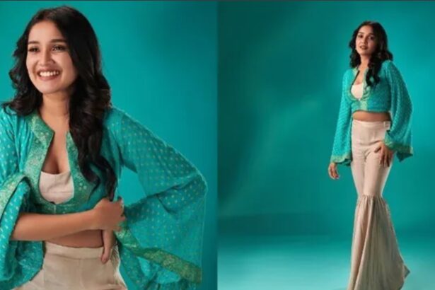 Anikha Surendran poses with a charming smile in a glamorous look
