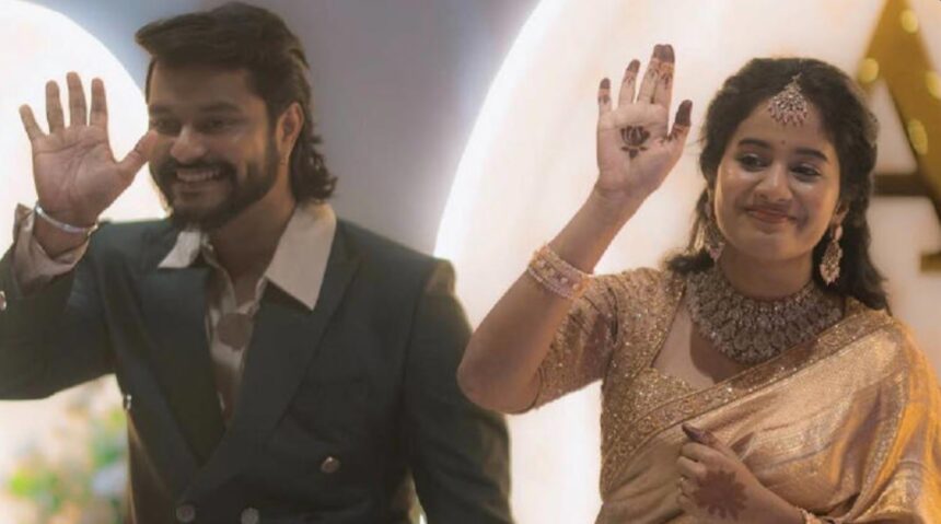 Brigida Saga and Anand Ram in traditional wedding attire