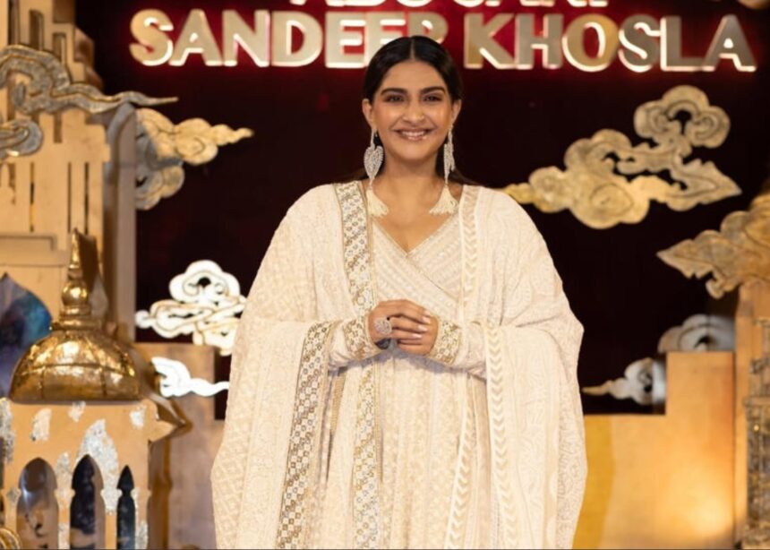Sonam Kapoor wearing an ivory Abu Jani Sandeep Khosla anarkali with statement silver earrings