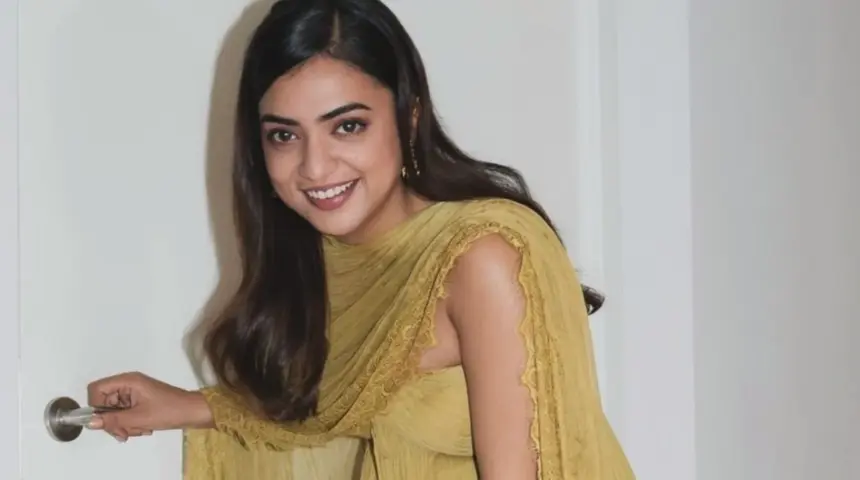 hunterfly 2026 10 31 093029 Nazriya Nazim wearing a green off-shoulder outfit at the Scene promotional event in Dubai