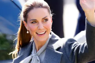 Princess Kate carrying a burgundy Smythson handbag during a royal engagement