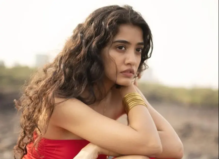 hunterfly Aarushi Bajaj Aarushi Bajaj in a vibrant pink dress with a thigh-high slit
