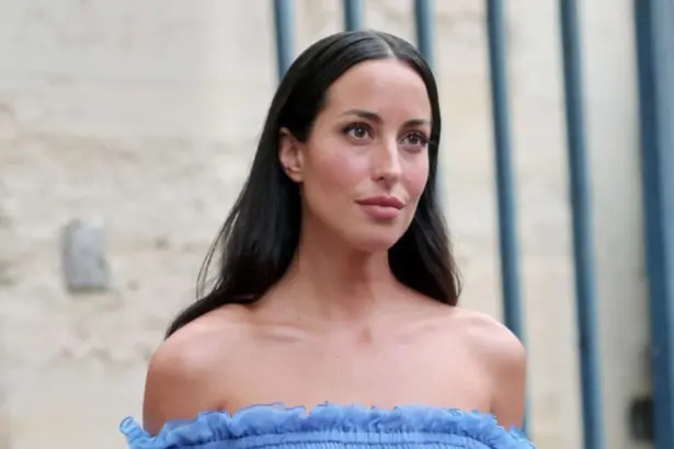 Ines de Ramon in a sheer blue off-the-shoulder gown at Chloé's Paris Fashion Week show
