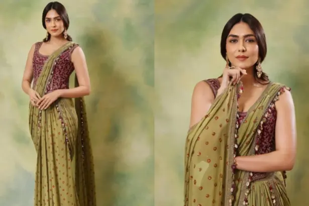 Mrunal Thakur wearing an olive green saree with an embroidered burgundy blouse