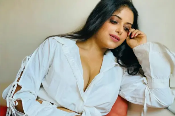 Sneha Paul wearing a white shirt in her latest photos