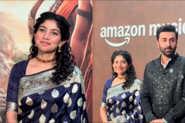 Sai Pallavi wearing a navy blue silk saree with silver detailing at the Ramayana music event in Chennai