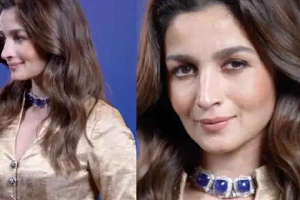 Alia Bhatt wearing a gold Banarasi jacket with matching trousers and a blue-stone choker